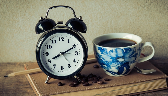 alarm clock and coffee